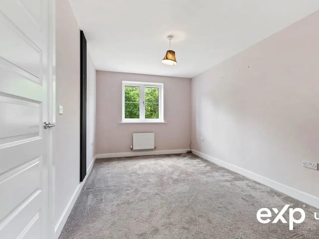 One of four spacious bedrooms in the property.
