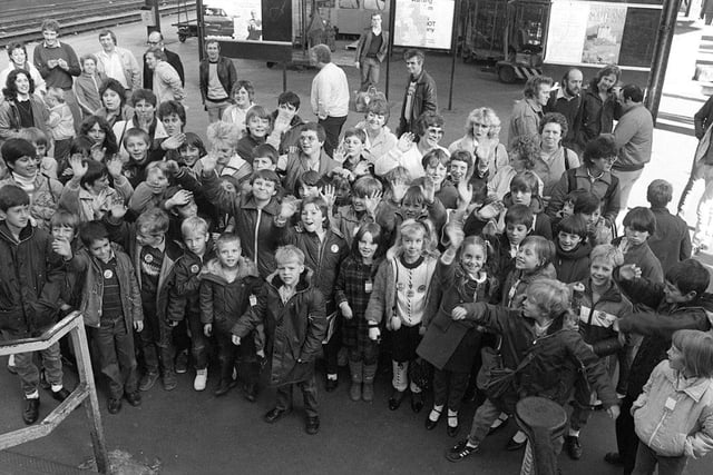 Children of striking miners at Sheffield Midland Station pictured before leaving for a trip to Blackpool in October 1984.