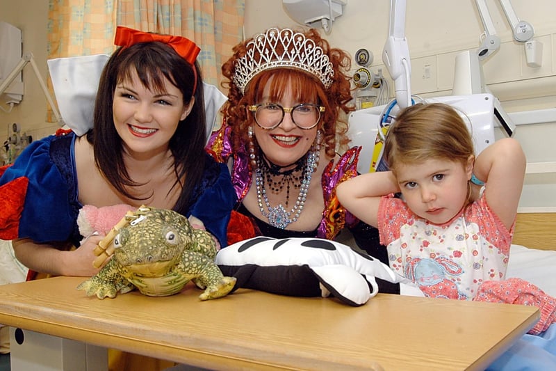 In 2006 Stars of Mansfield's pantomime Snow White visited young patients at the King's Mill Centre. Three-year-old Ellie McBroom from Shirebrook met stars Sue Pollard and Hollie Taylor, who plays Snow White.