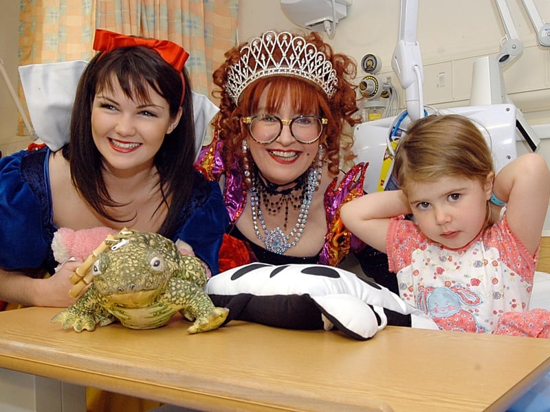 In 2006 Stars of Mansfield's pantomime Snow White visited young patients at the King's Mill Centre. Three-year-old Ellie McBroom from Shirebrook met stars Sue Pollard and Hollie Taylor, who plays Snow White.