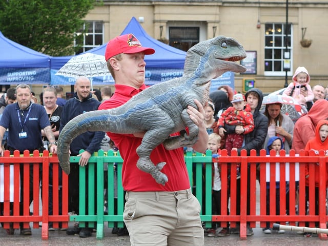 Dinosaur Blue meets the crowd.