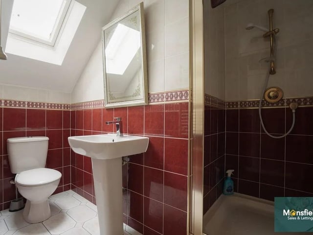 One of four bathrooms in the property.