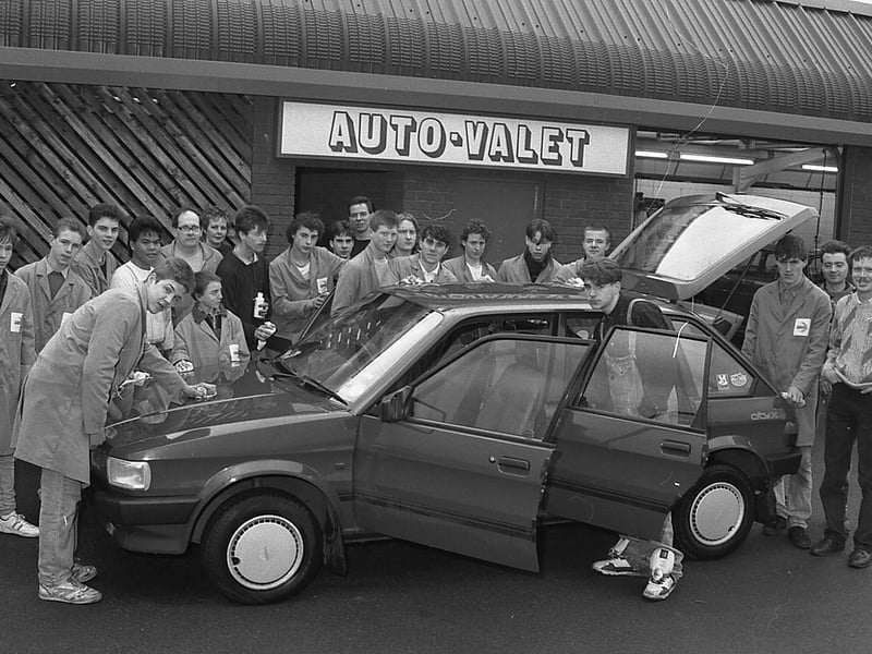 A new car is inspected back in 1989.