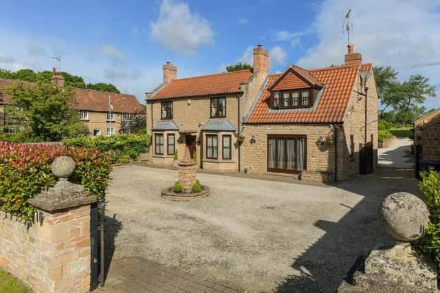 This magnificent family residence on Main Street, Linby is on the market for a whopping £1.25 million with Nottingham estate agents FHP Living.