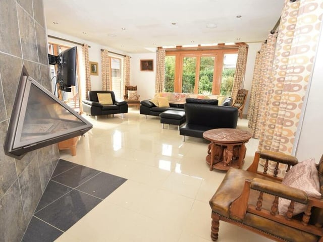 Take your shoes off as we begin our tour of the £749,500 house! The impeccable design-led interior is obvious as soon as you enter the hall, which leads you into the lounge. The smart decor and polished tiled flooring, with underfloor heating, set the tone for what is to follow.