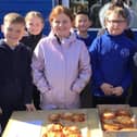 Children with their delicious pizzas