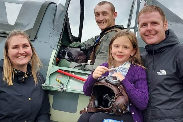 The Fradgley-Carter family pictured during Jacob's Spitfire flight at Duxford.