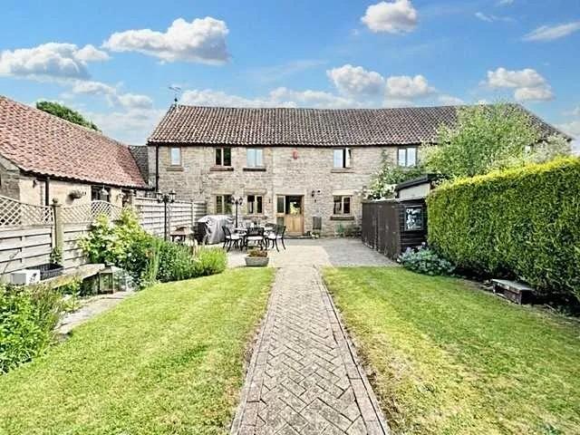 As charming as they come... Nestled along a quiet gravel driveway in Barn Court, this delightful two-bedroom barn-style cottage offers character, space, and countryside appeal in equal measure. With stable doors to both the front and rear, and a beautifully tended garden, this home is full of heart and waiting for its next chapter.