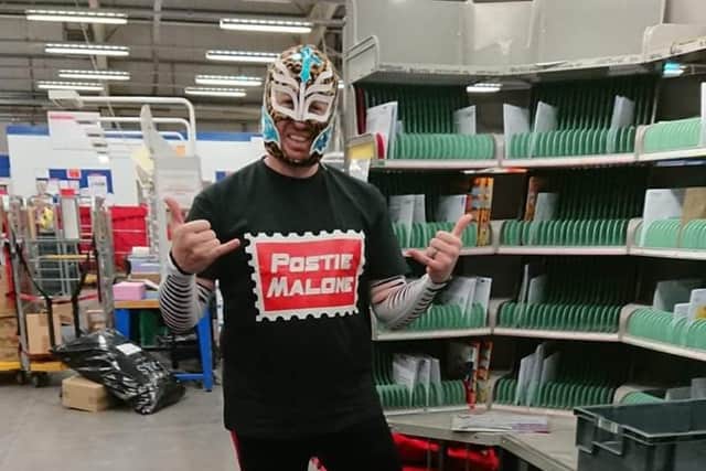Postman Glen Watson in fancy dress