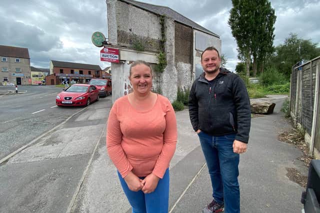 Coun Samantha Deakin and Coun Jason Zadrozny outside the old shop which has finally been sold