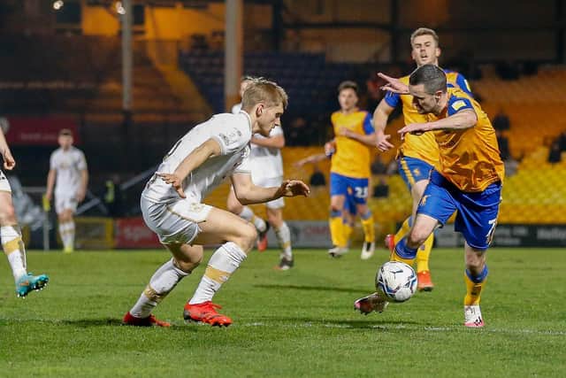 Jamie Murphy takes on a Port Vale defender during last week's encounter which Stags lost 3-1.
