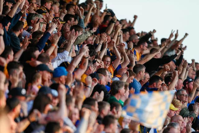 Mansfield Town fans celebrate. Photo by: Chris Holloway / The Bigger Picture.media