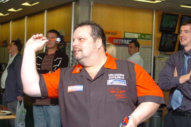 Free Press reporter Paul Goodwin challenged former world number one darts player Peter Manley, as he visits Betfred on Cleveland Street, and raised money for Doncaster Cancer Detection Trust  in 2007