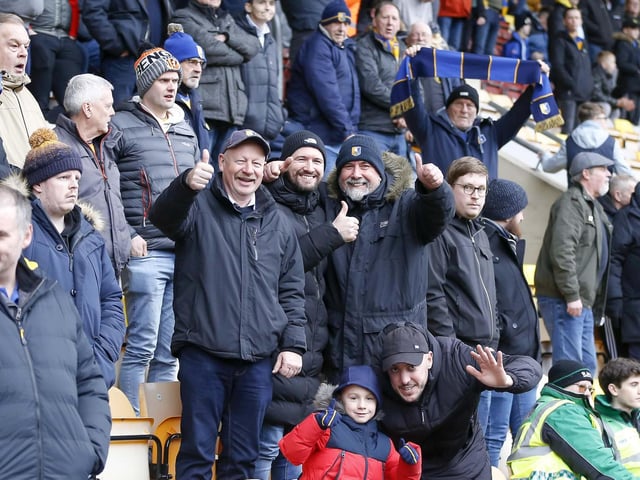 Travelling Stags fans watch the Sky Bet League 2 match against Bradford City.