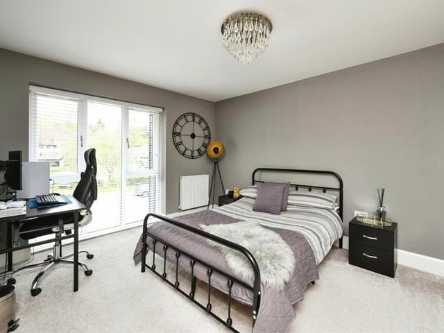 Moving up to the second floor of the £400,000 Mansfield property now, and the stylish decor continues in this bright bedroom, which faces the front and has space for a desk