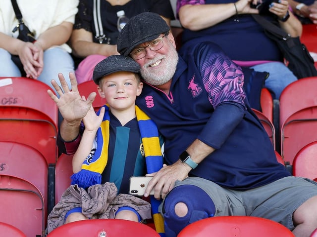 Mansfield Town fans watch the 1-1 draw at Grimsby in League Two.