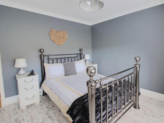 The second bedroom is slightly smaller than the master, but it still has a welcoming, relaxed feel, with views to the side of the property.