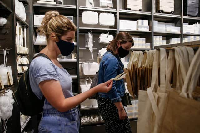 Face coverings will be mandatory in shops from July 24. (Photo by Hollie Adams/Getty Images)