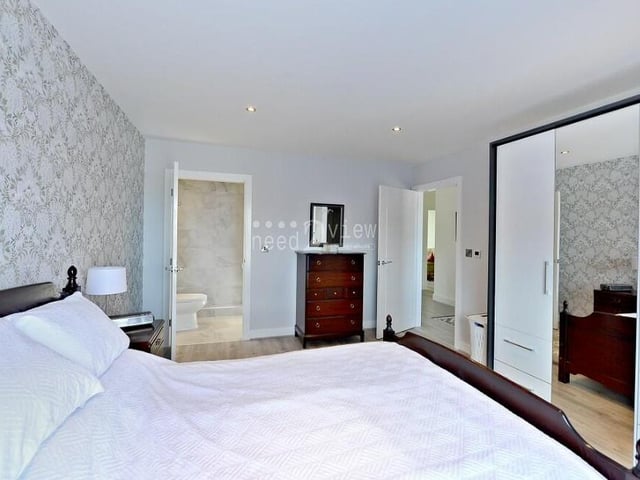 The master bedroom has space for wardrobes and access to an en suite shower room. Features such as a luxury grey laminated floor, a TV socket, power points and ceiling spotlights come as standard.