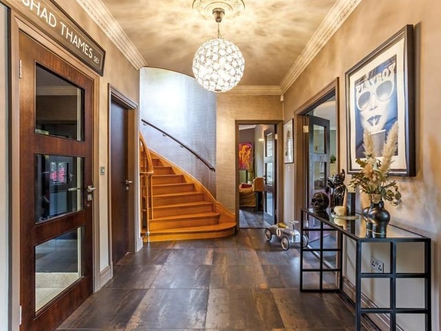 This salubrious entrance hall welcomes you into the Roebuck Drive property. Spacious and contemporary, it comes complete with beautiful, tiled flooring and underfloor heating. Ar the end is a curved oak staircase that ascends to the first floor.