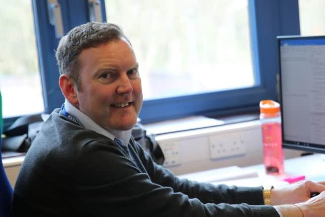 Former Qantas cabin crew member Nick Kendall-Edwards in his new role in the Nottinghamshire Police control room.