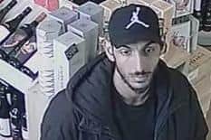 Police are investigating after two men stole a bottle of whisky worth up to £120 from a Nottinghamshire shop
