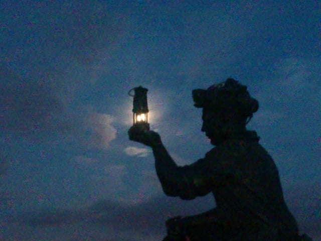 Jo Alvey sent us this photo of the full moon captured through the Davy lamp of the Testing for Gas statue at Silverhill Wood in Sutton