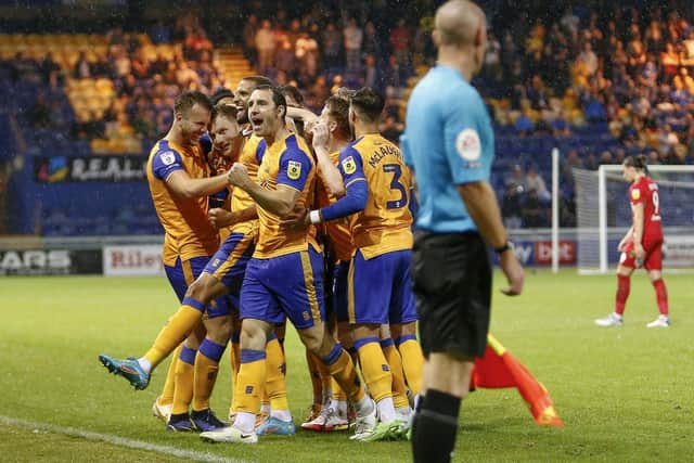 Stags celebrate against AFC Wimbledon on Tuesday. Photo by  Chris Holloway / The Bigger Picture.media