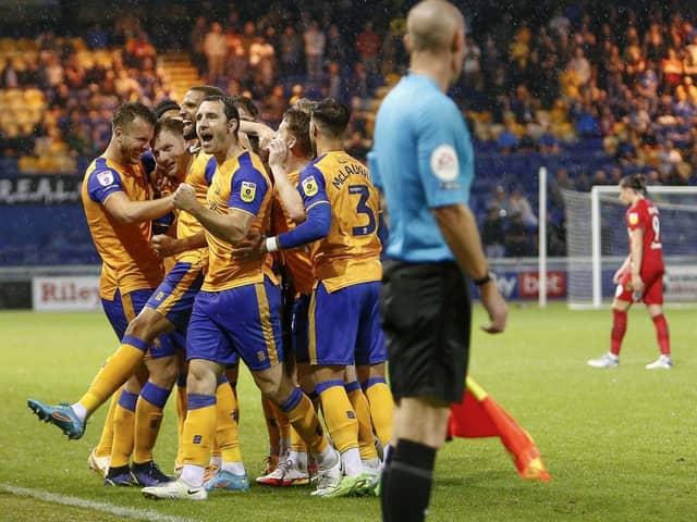 Stags celebrate against AFC Wimbledon on Tuesday. Photo by  Chris Holloway / The Bigger Picture.media