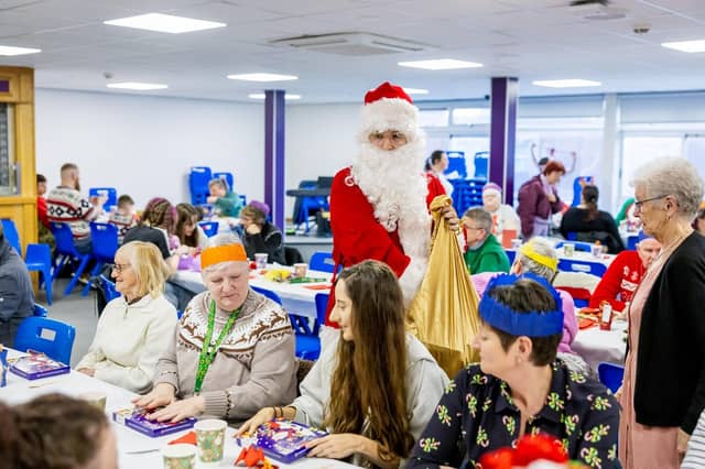 Sutton-in-Ashfield Rotary Club Santa Claus handed out selection boxes to the attendees