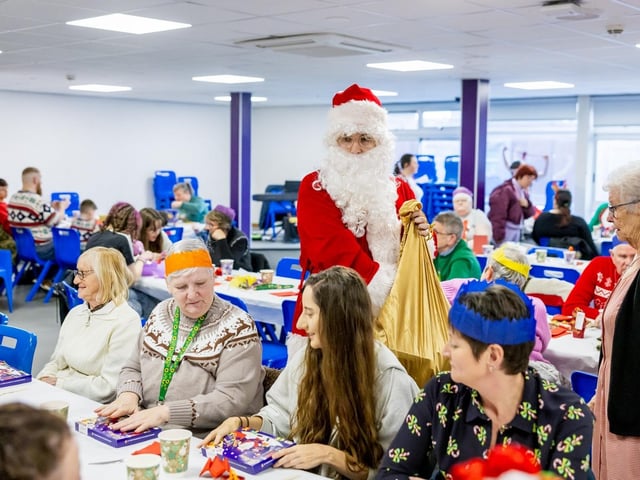Sutton-in-Ashfield Rotary Club Santa Claus handed out selection boxes to the attendees