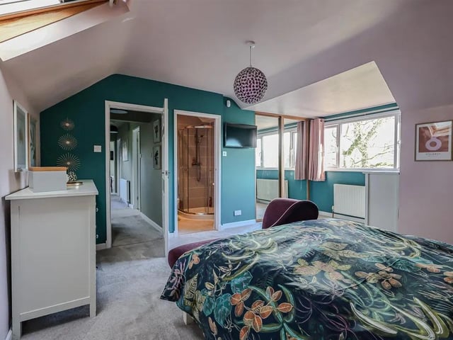 One of the spacious bedrooms in the home with luxury en suite bathroom.
