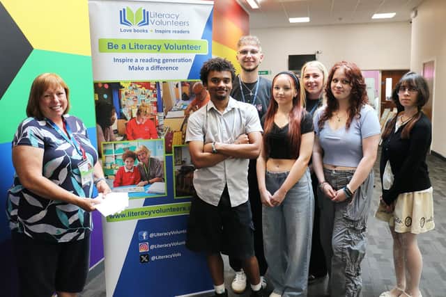 Sue Marriott, lead volunteer co-ordinator at Literacy Volunteers with production learning advisor Dom Jaques (back) and the students