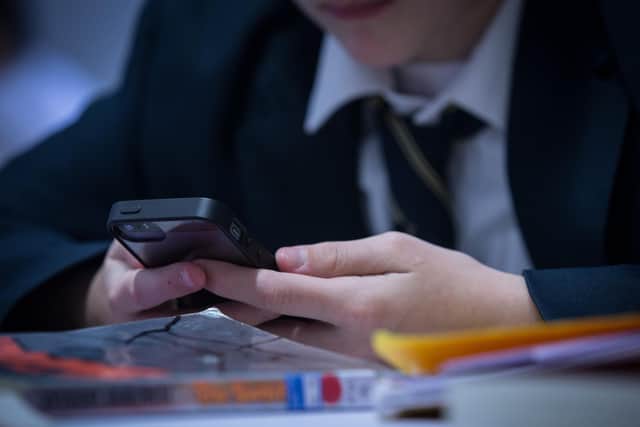 Pupils will not be allowed to use their phones at any point during the school day. (Photo by Matt Cardy/Getty Images)