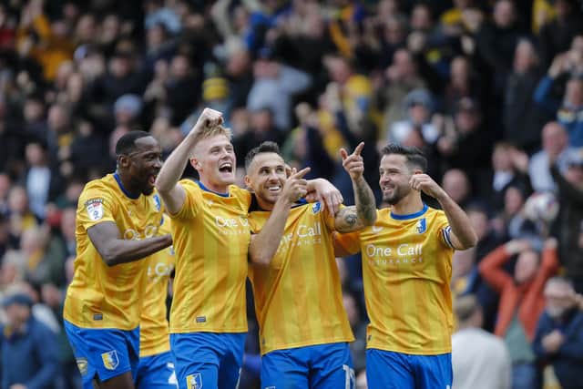 Stags celebrate during the Sky Bet League 1 match against Birmingham City FC at the One Call Stadium, 26 Oct 2024, Photo credit Chris & Jeanette Holloway / The Bigger Picture.media