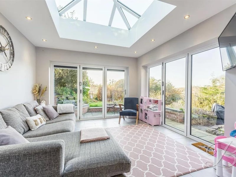 Light and airy room built with bi-folding doors to both the side and rear along with a skylight. This room is absolutely beautiful and creates the perfect setting for entertainment all year round.