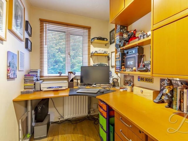 This is the spare room on the first floor of the £650,000 Lichfield Lane house. It is currently being used as a study but could be turned into a variety of uses.
