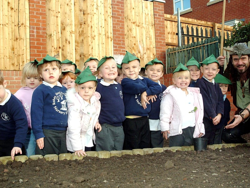 Foundation pupils at Robin Hood Primary School meet up with Sherwood Forest legend Robin Hood when he visited the Mansfield Woodhouse School with a sapling from the Major Oak. Year: 2007
