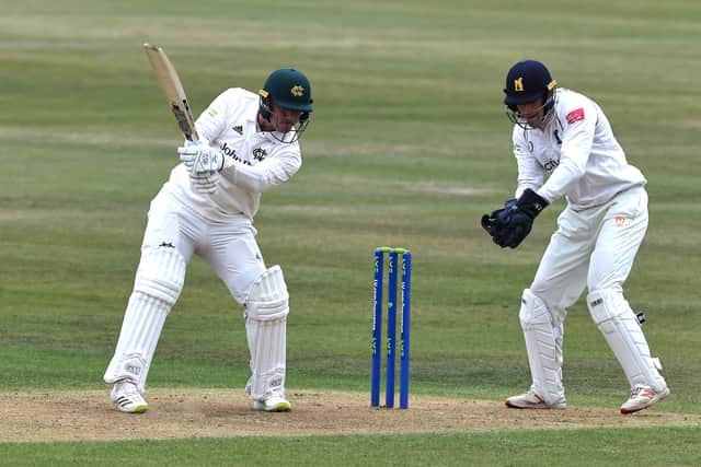 Liam Patterson-White hits a boundary. (Photo by David Rogers/Getty Images)