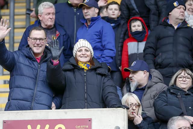 Travelling Stags fans watch the Sky Bet League 2 match against Bradford City.