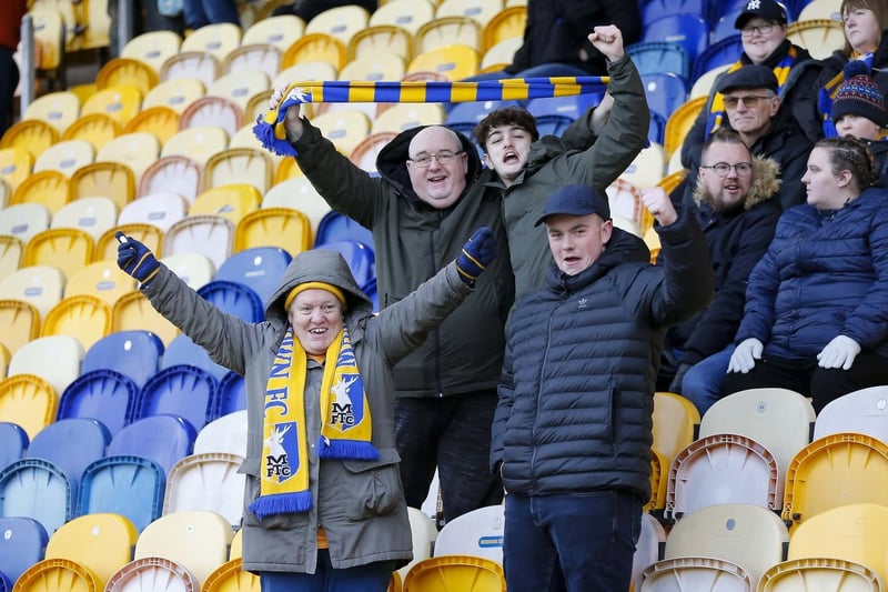 Mansfield fans during the Sky Bet League 2 match against Colchester Utd at the One Call Stadium, 03 Dec 2022.