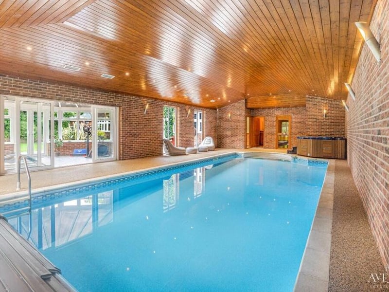 On to the wellness retreat at Lanesend House now, and if you fancy a dip, or even several lengths, this magnificent indoor swimming pool is the place for you. It is bright and warm and comes complete with shower room, toilet, Jacuzzi and conservatory with French doors giving access to the garden
