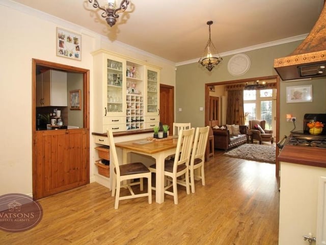 The kitchen/diner also includes a barn-style door that leads to the utility room.