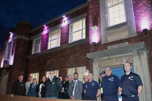 Ashfield councillors, together with police and fire service members, show their support for White Ribbon Day