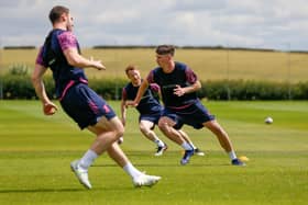 Stephen Quinn and team-mates are put through their paces during a training camp in Scotland.