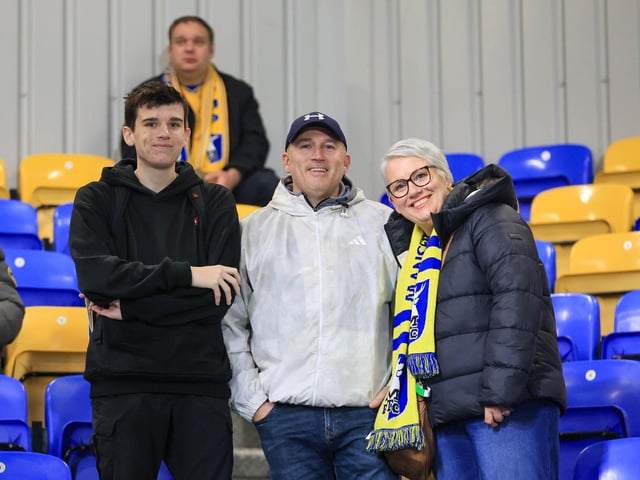 Travelling Mansfield Town fans during the Sky Bet League One match against AFC Wimbledon at Stadium Plough Lane.