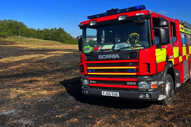 A fire engine at the scene of a grass fire in Warsop Vale.