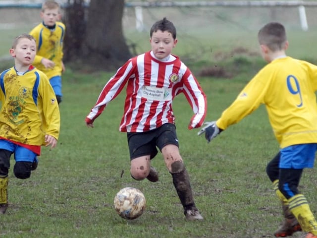 Robin Hood Colts (red and white stripes) v Woodhouse Colts U9s pictured at the Sherwood Fields ground in Edwinstowe in 2011
