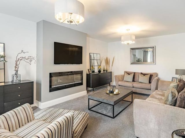 One of the most appealing features of the lounge is its remote-controlled, electric fire.