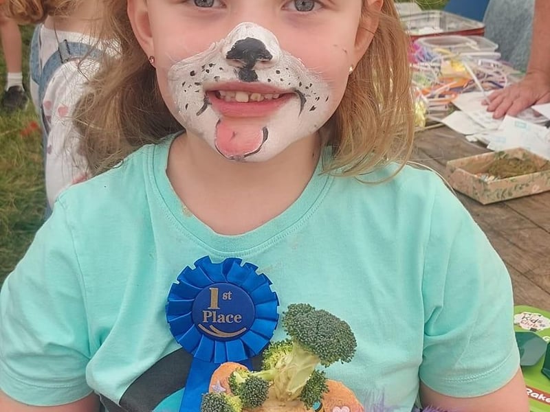 Aliyah and her award-winning veggie monster.